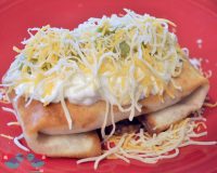 Amazing Chicken Chimichanga recipe - Delicious filling with a crispy outside! {The Love Nerds} #recipe #mexicaninspiredrecipe