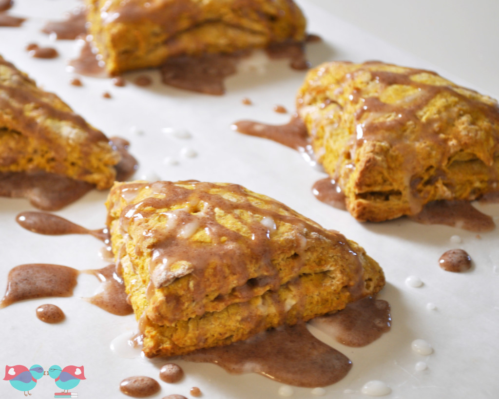 Homemade Spiced Glazed Pumpkin Scones - They are moist with the perfect combination of fall spices. {The Love Nerds} #fallrecipe #pumpkinrecipe #brunchidea 