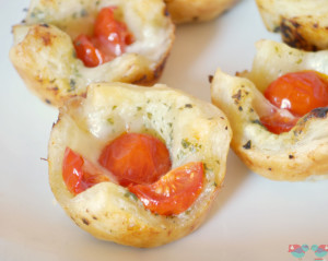 Mini Caprese Cups - a bite sized appetizer that gives you a caprese salad in a puff pastry cup! From The Love Nerds {https://thelovenerds.com}