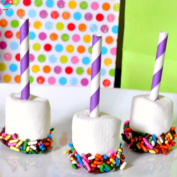 The perfect birthday treat! Chocolate Dipped Sprinkle Marshmallows with a Straw Birthday Candle! {The Love Nerds}