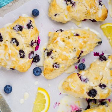 Glazed Lemon Blueberry Scones Recipe: Bake your way to a great Easter or Mother's Day brunch with this a delicious pastry! It's a perfect breakfast recipe! | The Love Nerds