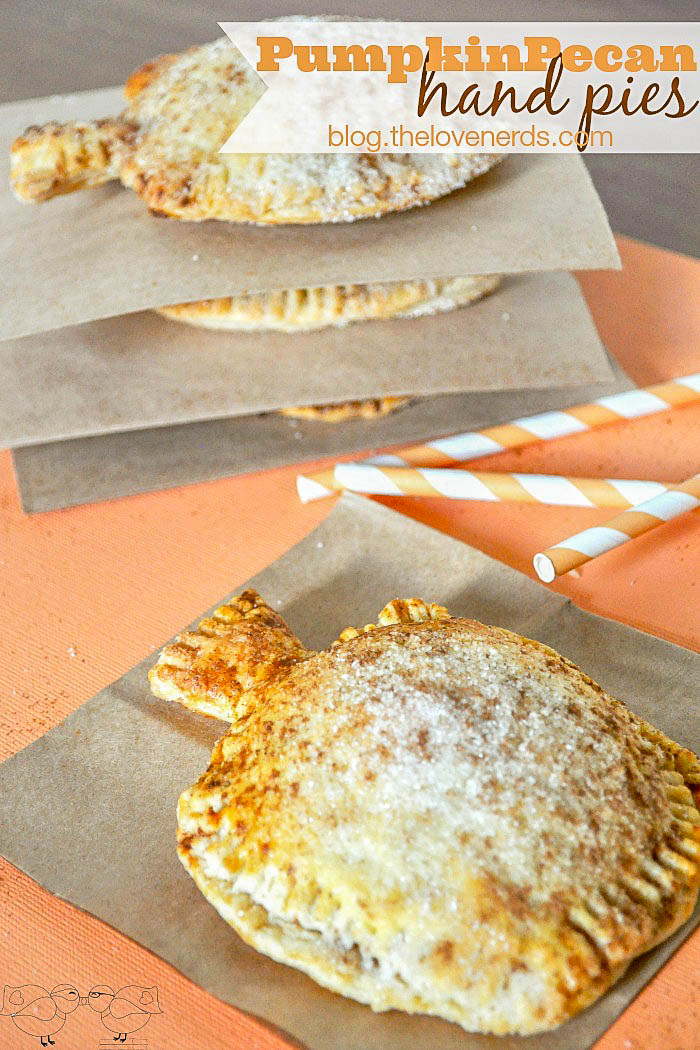Adorable Pumpkin Pecan Hand Pies! These individual pies, shaped like a pumpkin no less, are the perfect holiday dessert. Cute and Delicious! | The Love Nerds