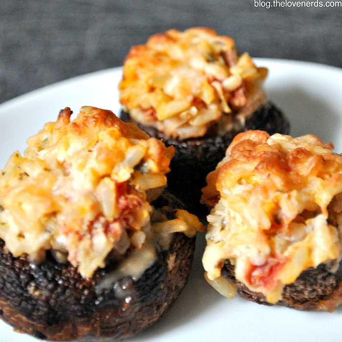 These Italian Goat Cheese and Tomato Stuffed Mushrooms have a creamy, rich flavor that everyone will love! These make both a great appetizer and side dish! {The Love Nerds} #ad #minuteholiday 