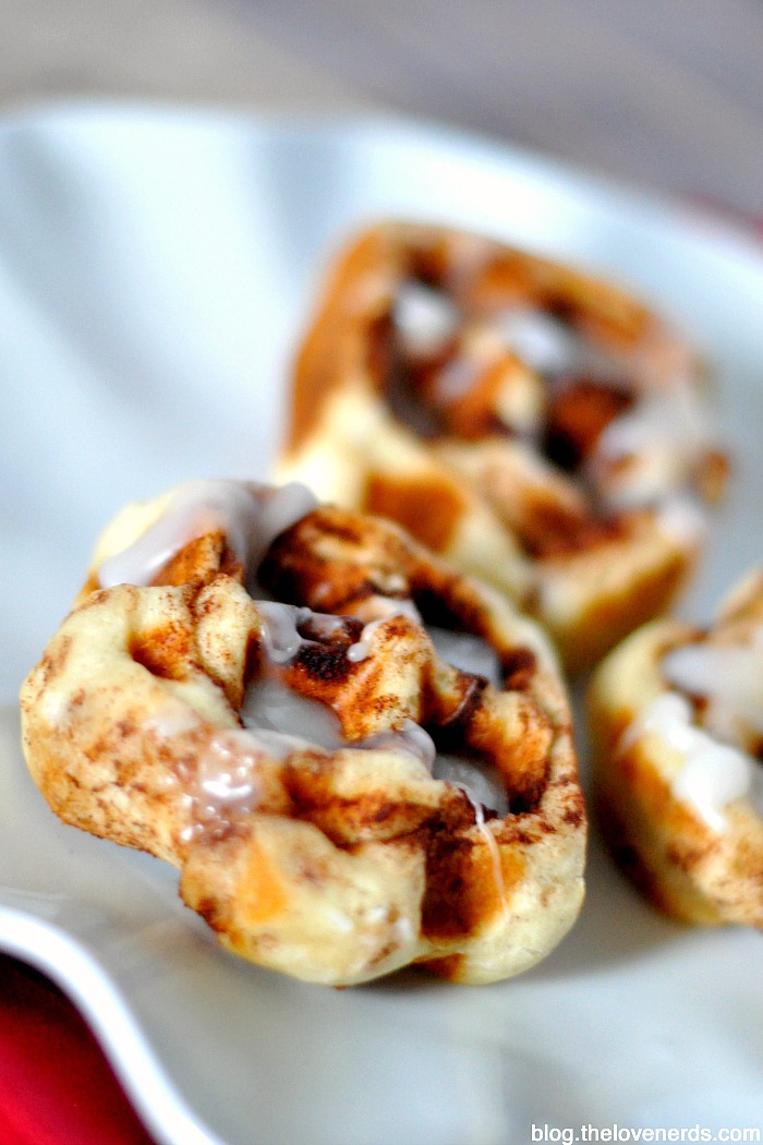 Cinnamon Roll Waffles - An easy and special twist on a regular can of cinnamon rolls - crisp on the outside with a soft, gooey middle! {The Love Nerds} 