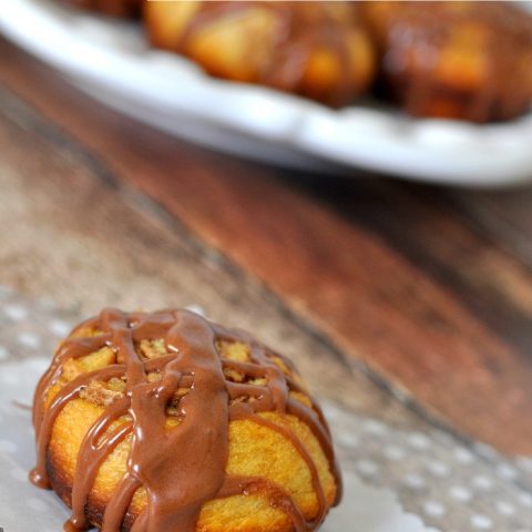 Easy and completely addictive Chocolate Glazed Cookie Butter Cinnamon Rolls! They are too easy not to make! {The Love Nerds}