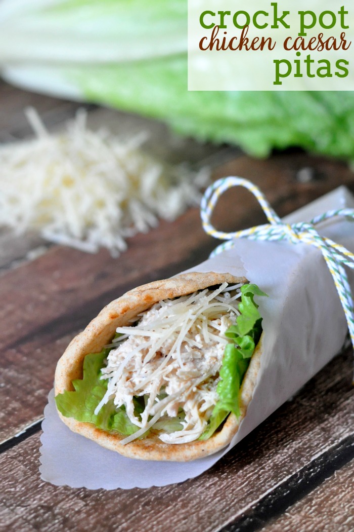 Crock Pot Chicken Caesar Pitas are perfect for summer - easy to make, light, cooked in a slow cooker and DELICIOUS! Plus, it makes great leftovers! |The Love Nerds