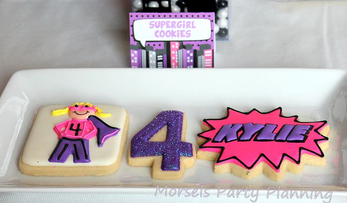 If you have a little girl with big dreams of being a Superhero when she grows up, then this Girly Superhero Party in pink, purple and black is for you. | The Love Nerds