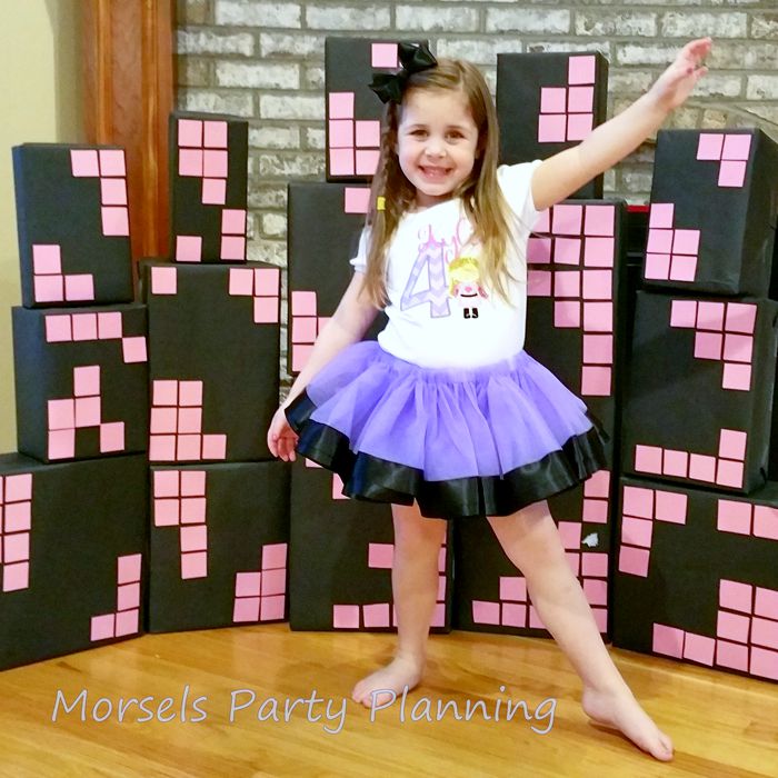 If you have a little girl with big dreams of being a Superhero when she grows up, then this Girly Superhero Party in pink, purple and black is for you. | The Love Nerds
