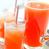 My new favorite summer cocktail recipe - Tropical Fruit Spritzer. One sip and you’ll wish you were in Maui on a beach! | The Love Nerds Contributors