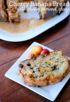 Cherry Banana Bread with Cherry Almond Glaze - Definitely the best banana bread I've ever made. Rustic, moist, sweet and stuffed full of sweet, delicious Rainier cherries. Oh, and chocolate chips! | The Love Nerds Contributors