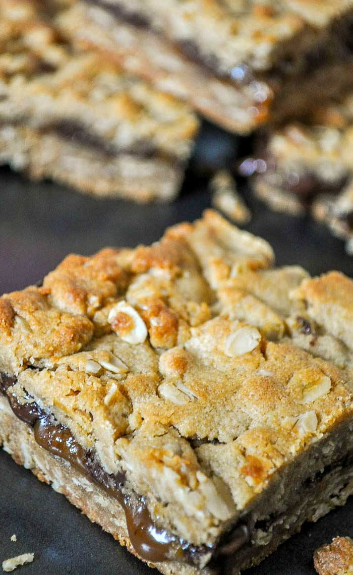 Decadent Dark Chocolate Peanut Butter Carmelitas! So good that you won't want to share a single bite of this dessert bar recipe! | The Love Nerds