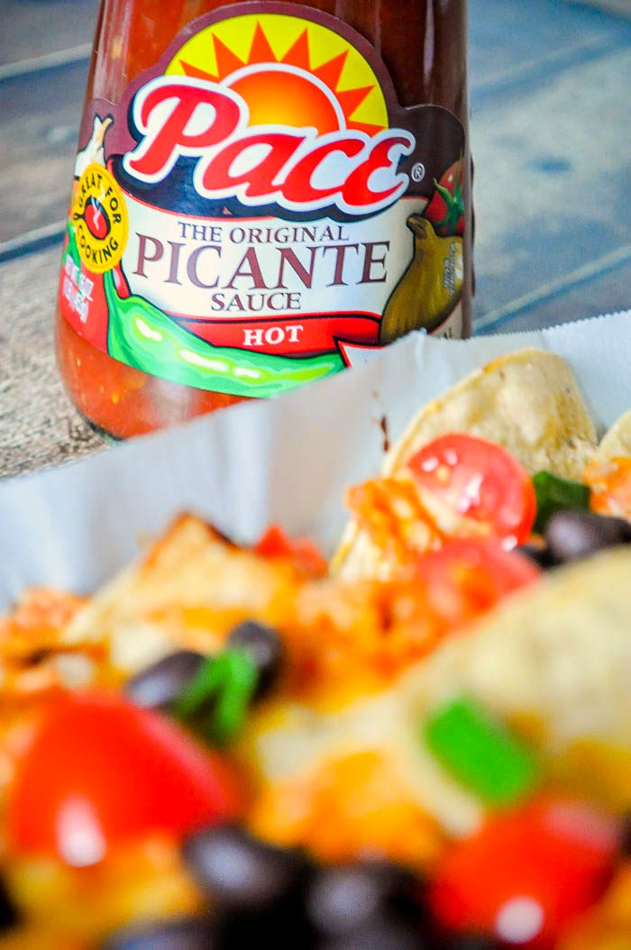 Festive Chicken Taco Nachos - A delicious recipe for parties or Game Day that can be ready in just 15 minutes! | The Love Nerds #StockUpOnPace #JewelOsco #ad 