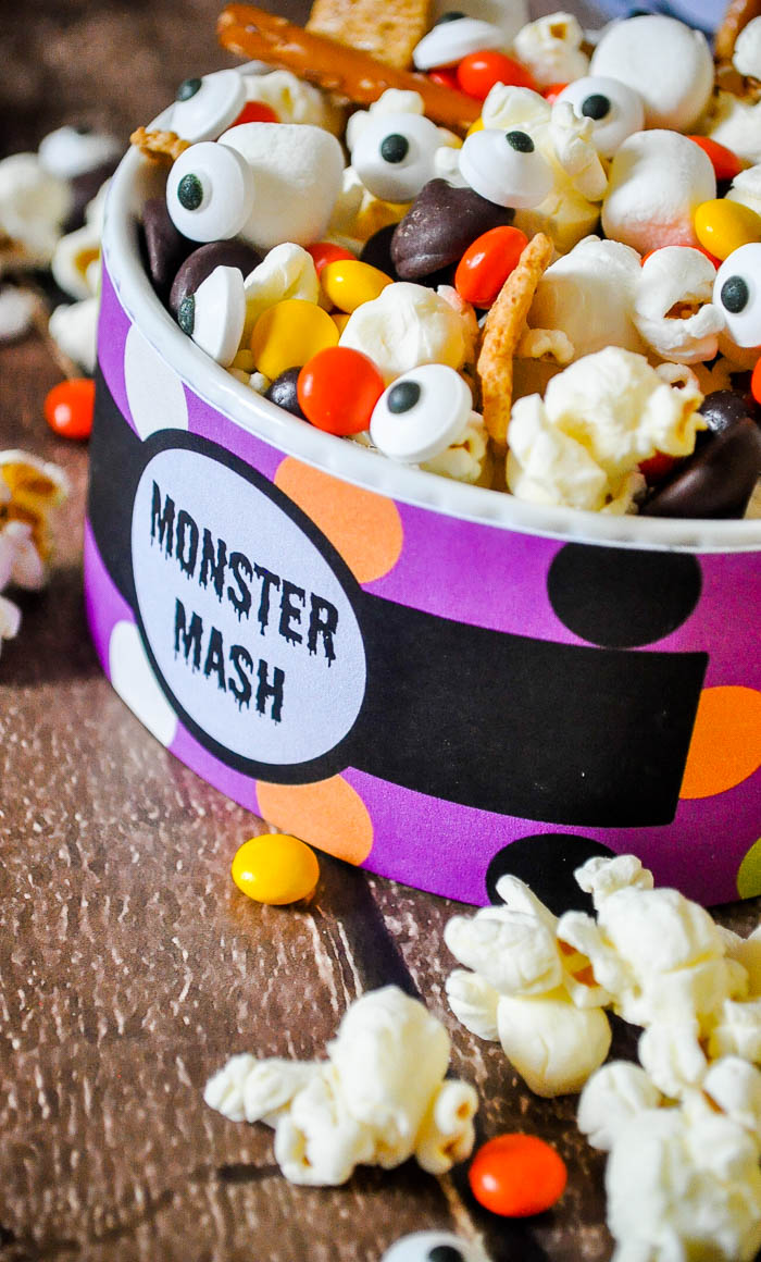 Monster Mash - A Fun and Easy Halloween Trail Mix! Creating a Halloween recipe doesn't need to be hard. Use my free printable to make this Monster snack! | The Love Nerds
