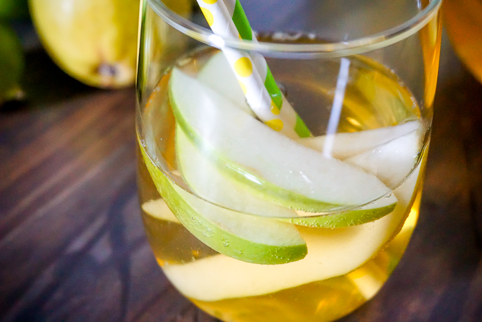 Green Apple and Pear Sangria Recipe - A delicious wine recipe that everyone will love with the perfect combination of sweet and tangy. | The Love Nerds #ad