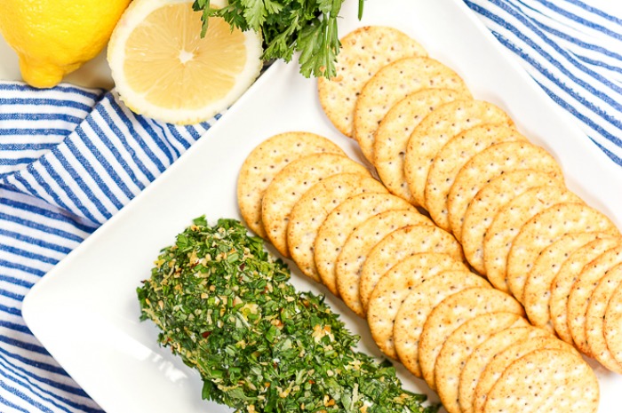 Lemon and Herb Goat Cheese Log - A light and refreshing appetizer that guests will love all year long! Plus, it's such an easy appetizer recipe to prep, it's a shame not to! | The Love Nerds