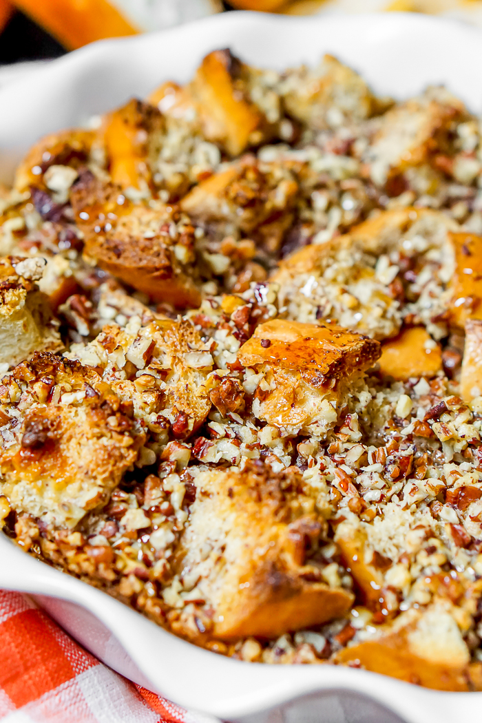 Pecan Pie French Toast Bake is warm, nutty, and holiday perfection! This brunch recipe will make you happy with every single bite! | The Love Nerds 