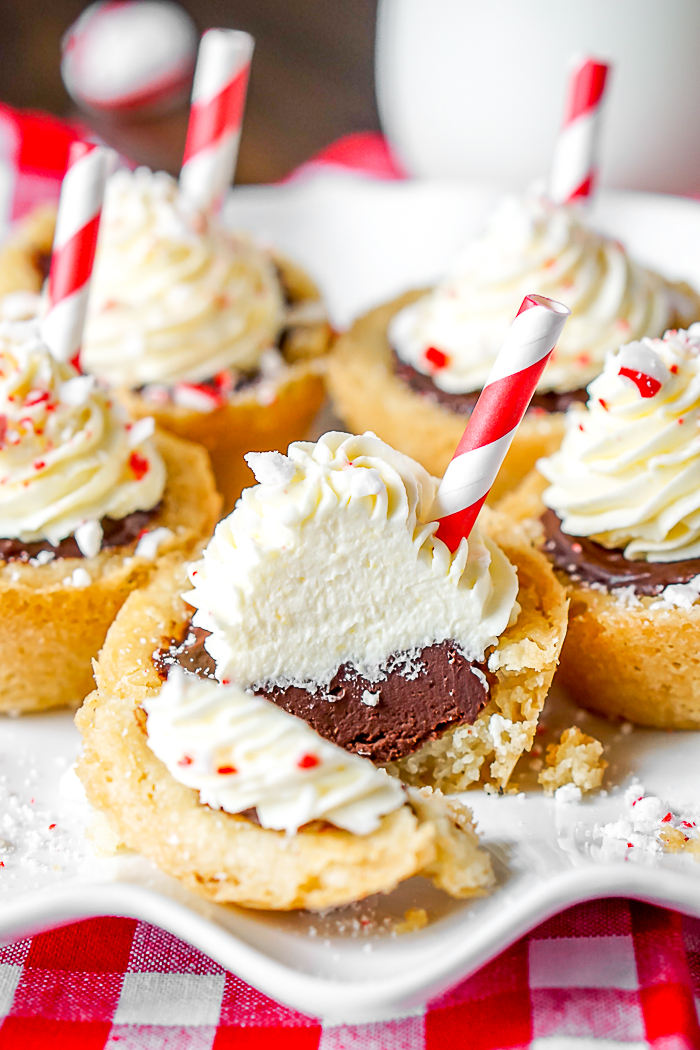 Peppermint Whip Topping on a Hot Chocolate Cookie Cup should definitely make it on your Christmas dessert menu! Chocolate and Peppermint is a winning combo for holiday desserts! 