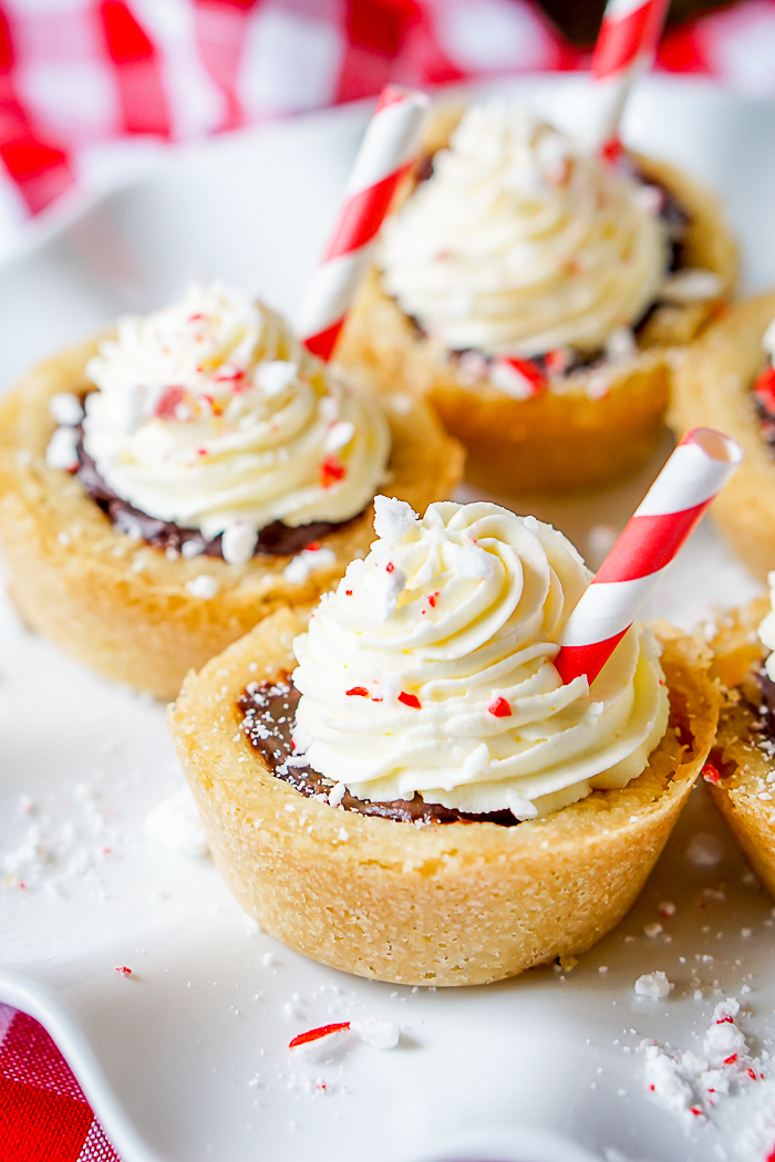 Peppermint Hot Chocolate Cookie Cups are a gorgeous holiday cookie your guests will love! With non-wilting whipped topping, great Christmas cookie for office parties, cookie exchanges, neighborhood gifts, and more. 
