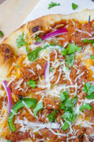 BBQ Pulled Pork Flatbread Pizza - Whether you want to enjoy this recipe for lunch, dinner or with your friends on Game Day, this easy flatbread recipe is ready in no time and always delivers great flavor! | The Love Nerds