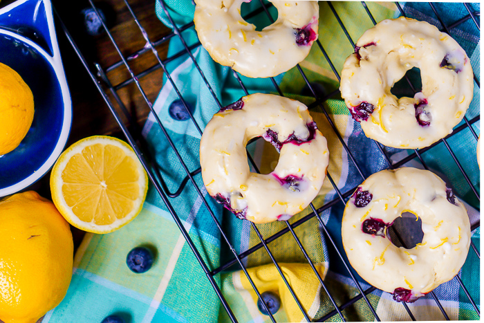 Baked Lemon Blueberry Donuts Recipe - Sweet and tangy flavors combine for the perfect baked donut! Make this breakfast recipe for your next holiday or brunch! | The Love Nerds AD BobsSpringBaking @BobsRedMill