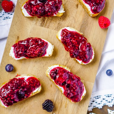 Crostini appetizers make party menus simple while still being big on flavor, and these Goat Cheese Crostinis with a homemade berry jam is the best crostini appetizer! Sweet, Tangy and Gorgeous!