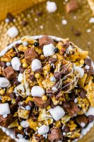 Double Chocolate Caramel Snack Mix is an easy sweet chex party mix with caramel, chocolate, white chocolate, snickers bites, mini marshmallows and gold and silver sprinkles. Perfect party dessert for a big birthday or New Year’s Eve!