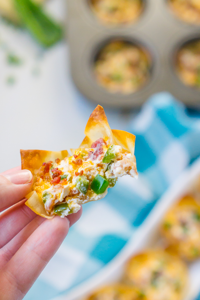 Easy Bacon Jalapeno Popper Wonton Cups make the perfect game day food! Warm, flavorful with just the tiniest hint of heat from the jalapeño and easy to make! All you have to do is mix together your simple ingredients and bake inside a wonton cup for a fun appetizer recipe everyone will love! 