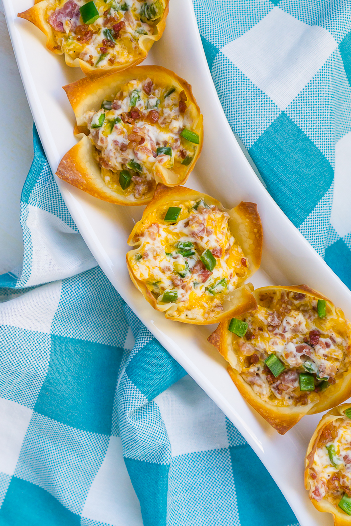 Baked Wonton Cups with Bacon Jalapeño Popper filling! These Jalapeño Popper Wontons are easy to make and come out warm, cream, and full of flavor! A must try party appetizer that your guests will love! 