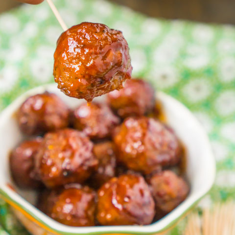 Sweet and Sour Meatballs Crock Pot Style with only a few key ingredients - grape jelly, chili sauce, cocktail meatballs and a little seasoning. It’s an easy meatball recipe that is always a party food hit!!