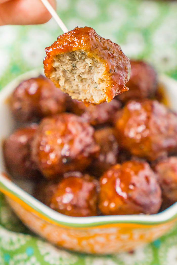 Sweet and Sour Meatballs Crock Pot Style with only a few key ingredients - grape jelly, chili sauce, cocktail meatballs and a little seasoning. It’s an easy meatball recipe that is always a party food hit!! 