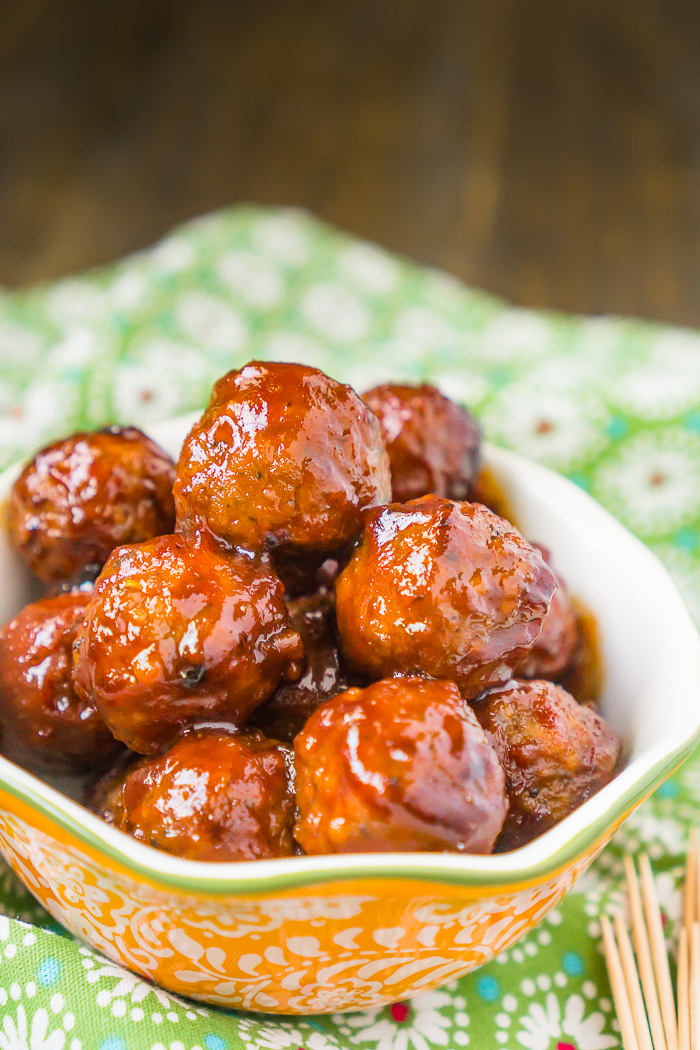 Slow Cooker Sweet and Sour Meatballs is an incredibly easy meatball recipe that is always a big hit!! They make the perfect game day appetizer, party cocktail meatball, or easy dinner idea over rice!