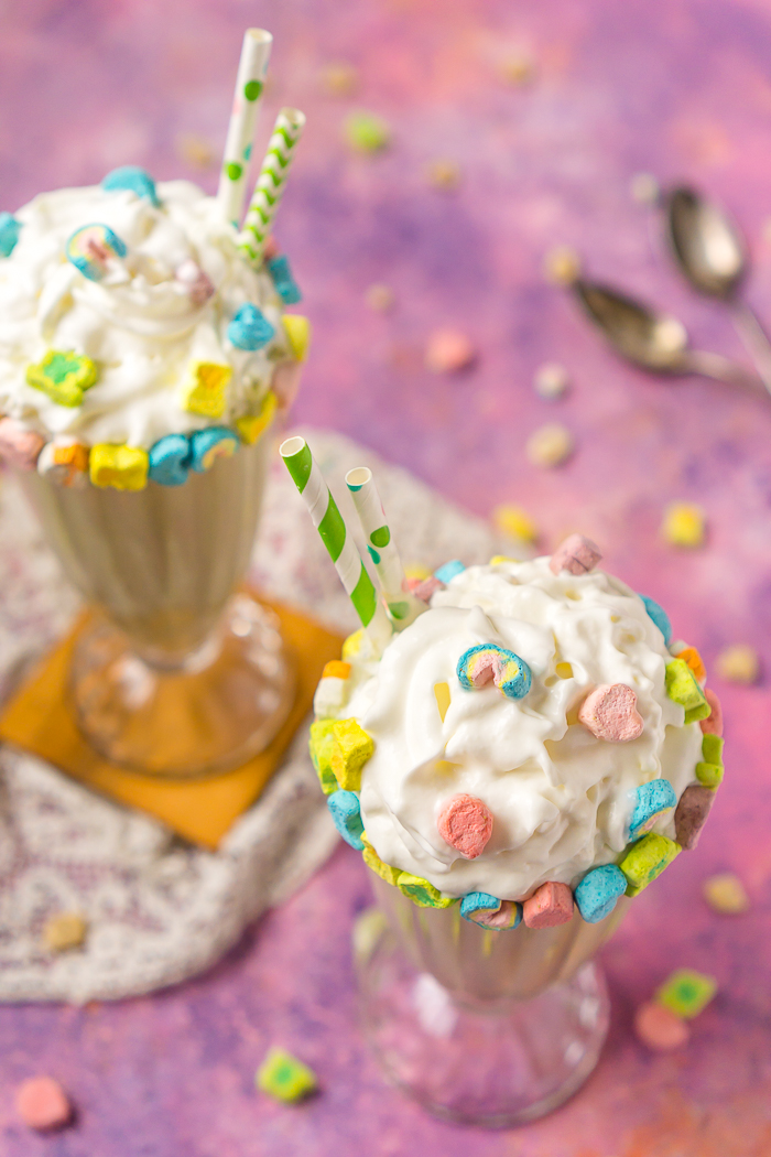 This Lucky Charms Milkshake is a non-Alcoholic St. Patrick’s Day drink recipe you are going to love. Made with vanilla ice cream, Lucky Charms cereal, Lucky Charms marshmallows, milk and sprinkles! 
