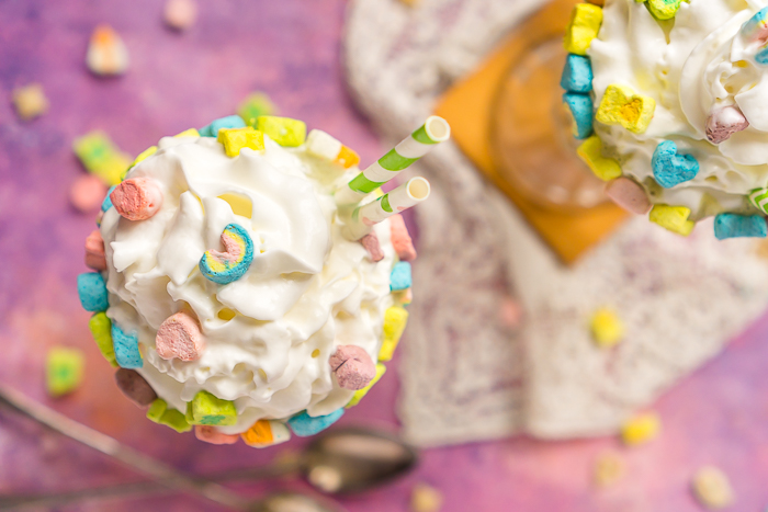 Lucky Charms recipes are perfect kid friendly recipes for St. Patrick's Day, especially this Lucky Charms Milkshake! Fun, colorful, and sweet - this milkshake recipe will be slurped up right before your eyes! 
