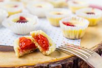 Mini Cheesecakes with Vanilla Wafers for a crust is a crowd favorite dessert recipe! All the creamy goodness of cheesecake in tiny bite form that are easy to serve and easy to enjoy. You seriously need to give this mini cheesecake recipe a try at your next celebration! 