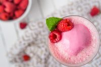 Take your next champagne toast to a whole new level of decadence with a Raspberry Champagne Float! It's a cocktail recipe and dessert recipe in one that's perfect for a special occasion like Valentine's Day or New Year's Eve. Or just because you deserve to treat yourself! 