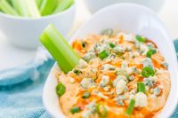 Enjoy all the flavor of buffalo chicken wings without the mess or calories with our Frank's Buffalo Chicken Dip! Creamy, spicy and a huge crowd pleaser! Your friends and family will thank you for this slow cooker buffalo chicken dip! 