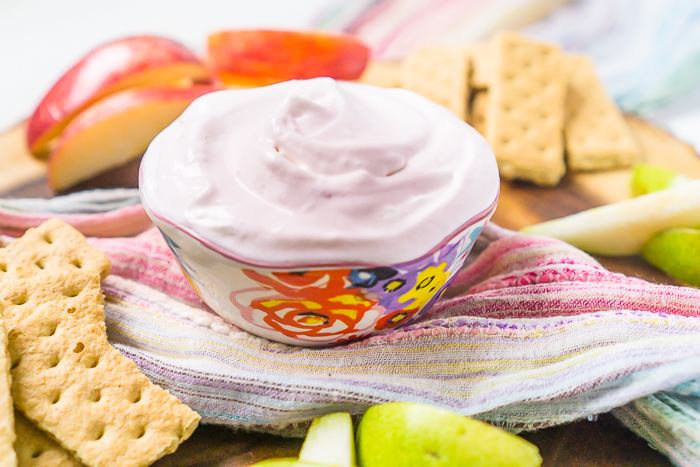 This light, sweet Strawberry Cool Whip Fruit Dip was one of my favorite kid recipes growing up that my mom would make, and I still love it as a mom myself now, too! Easy to make and a delicious pairing with Strawberries, grapes, apples, graham crackers and more! 