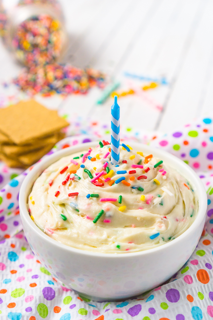 Delicious Birthday Cake Cheesecake Dip - a cream cheese cheesecake dip with funfetti cake mix, sour cream, and sprinkles! 