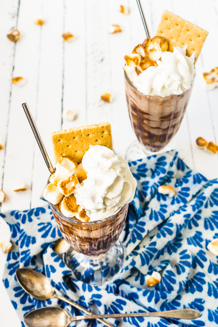 Stay cool this summer by taking the classic summer dessert away from the fire pit and into a tasty and refreshing S'Mores Milkshake! With chocolate ice cream, graham crackers, COFFEE-MATE® Toasted Marshmallow Mocha Liquid Coffee Creamer and a generous dollop of Reddi-wip, you are going to want to share this summer ice cream treat with all your friends and family! 