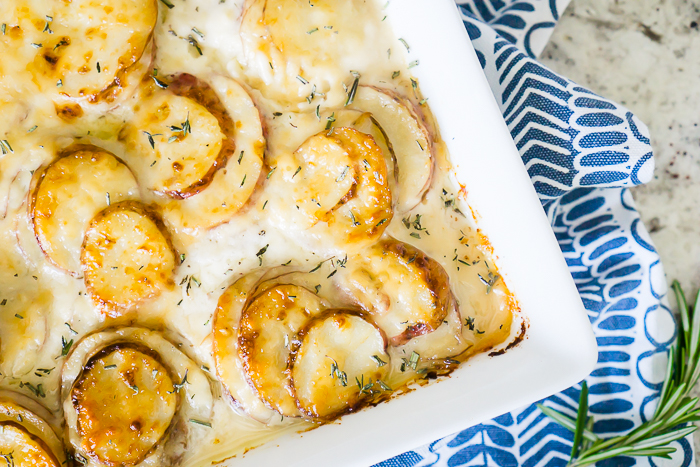 Creamy Au Gratin Potatoes filled with fresh white cheese and herbs 