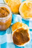 This 5 ingredient Slow Cooker Pumpkin Butter is absolutely addicting and a fall pumpkin recipe staple for us because it makes the perfect ingredient for fall baked goods, main dish recipes and even morning toast! | THE LOVE NERDS