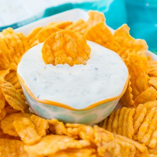 This is the Best Chip Dip Recipe for the big Game Day because it's so versatile! Only 3 ingredients and you have a light, herbed chip dip that pairs well with every chip. | THE LOVE NERDS #chipdip #appetizer #gamedayfood